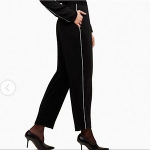 Cropped black carrot trousers